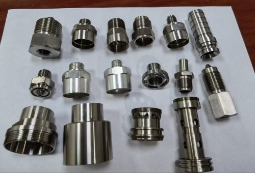 sensor shells, threaded fittings, mounting pins, locking sleeves and mini precision turned parts